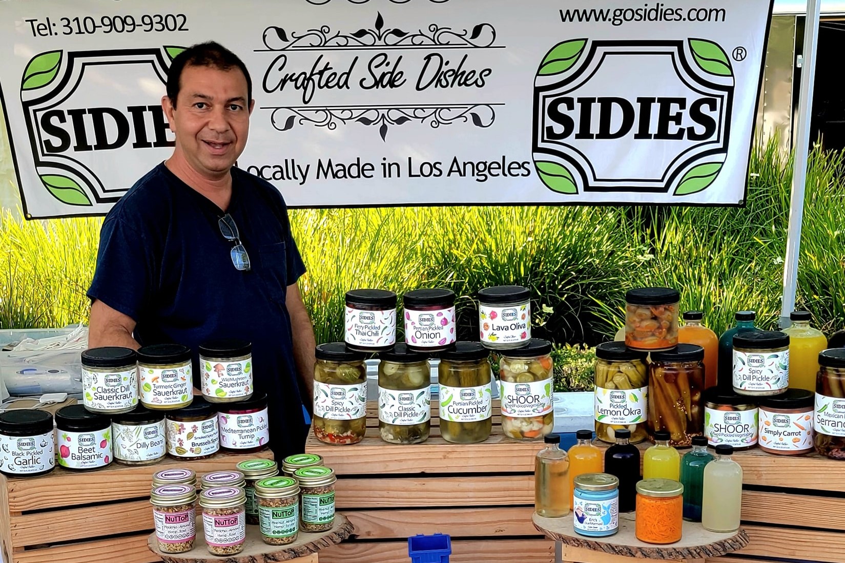 Man with pickled and fermented products.