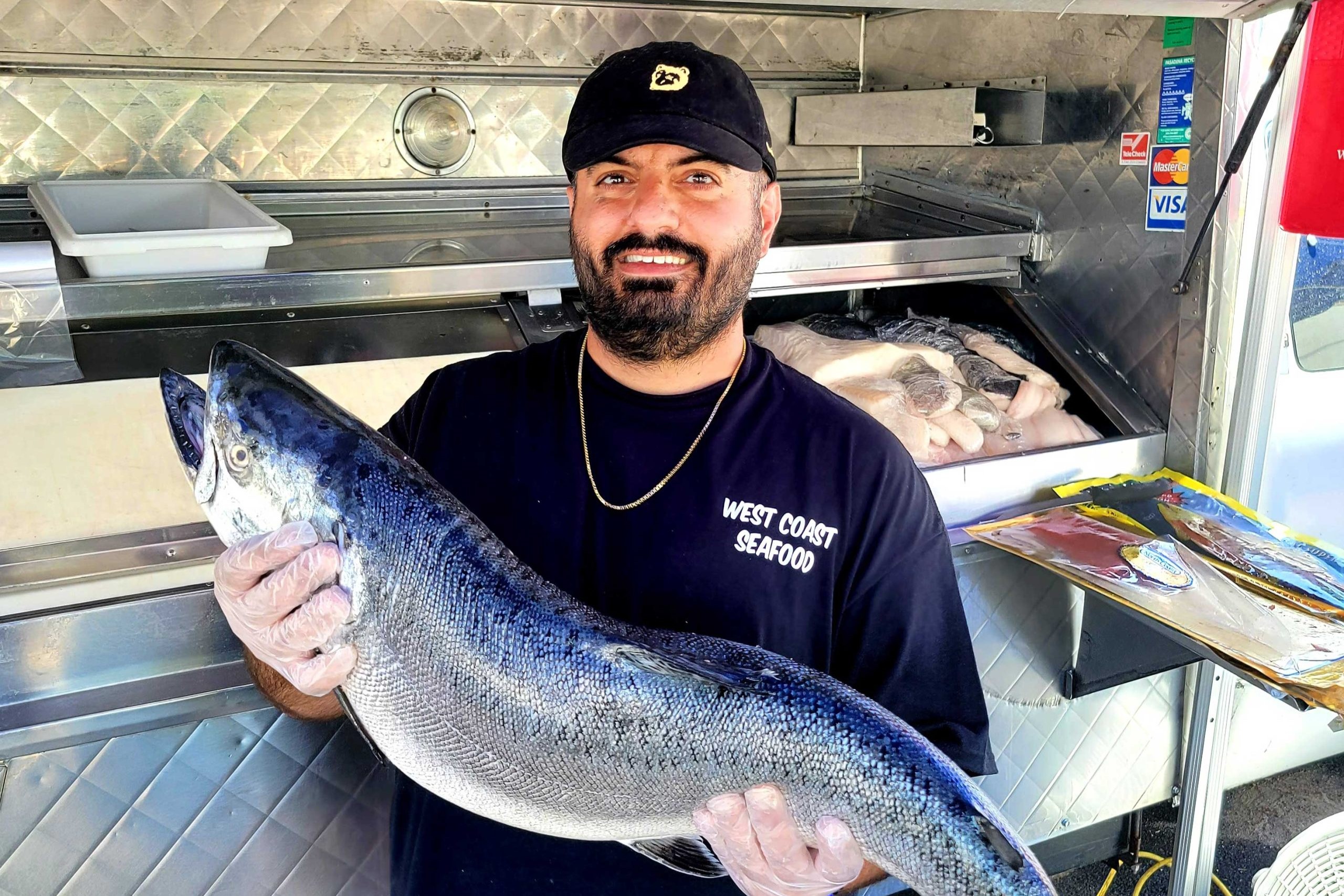 Man holding a large fish.